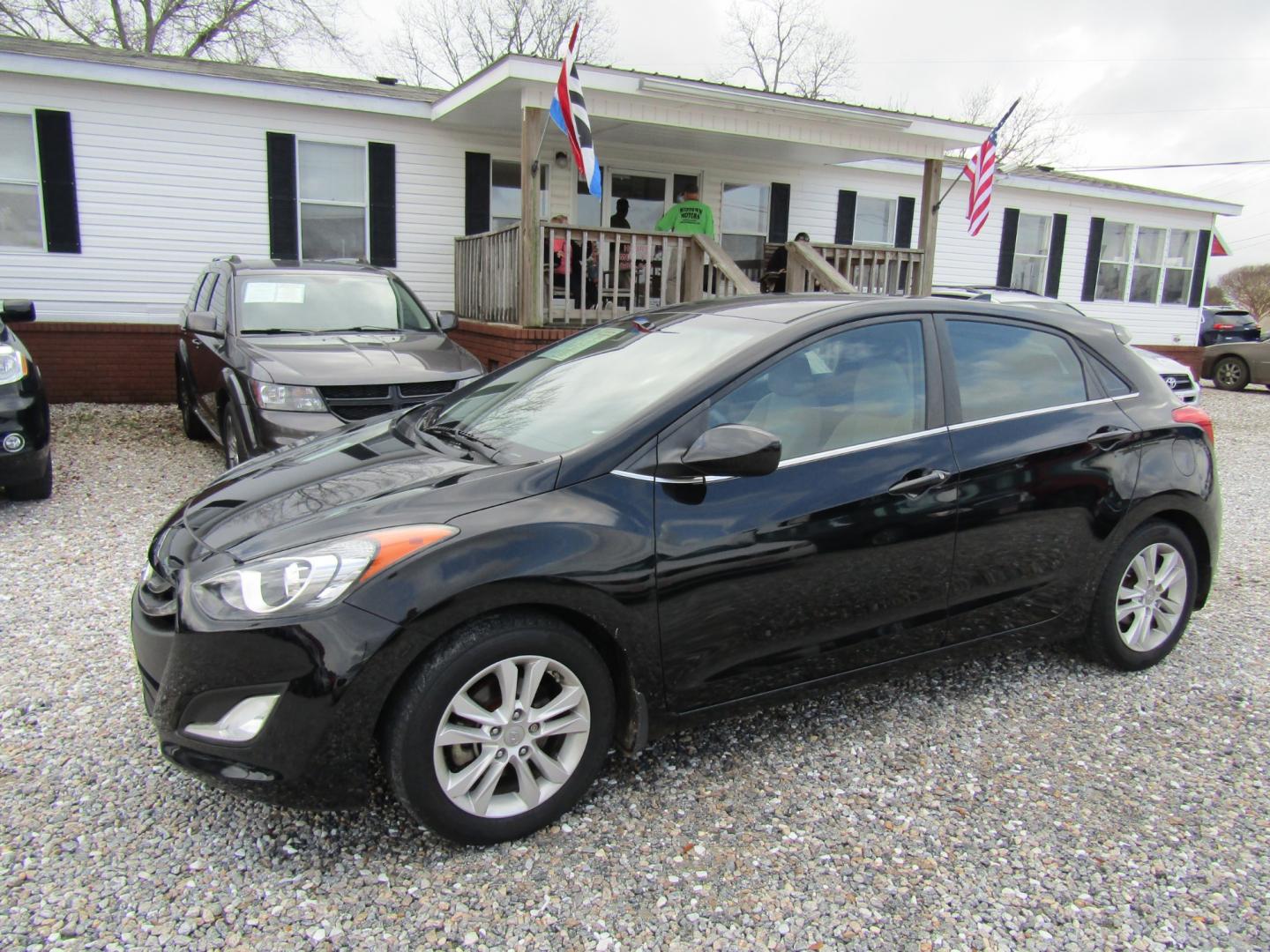 2013 Black Hyundai Elantra GT A/T (KMHD35LE1DU) with an 1.8L L4 16V DOHC engine, 6-Speed Automatic transmission, located at 15016 S Hwy 231, Midland City, AL, 36350, (334) 983-3001, 31.306210, -85.495277 - Photo#2